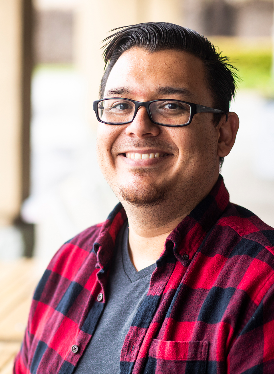 Smiling latino male student